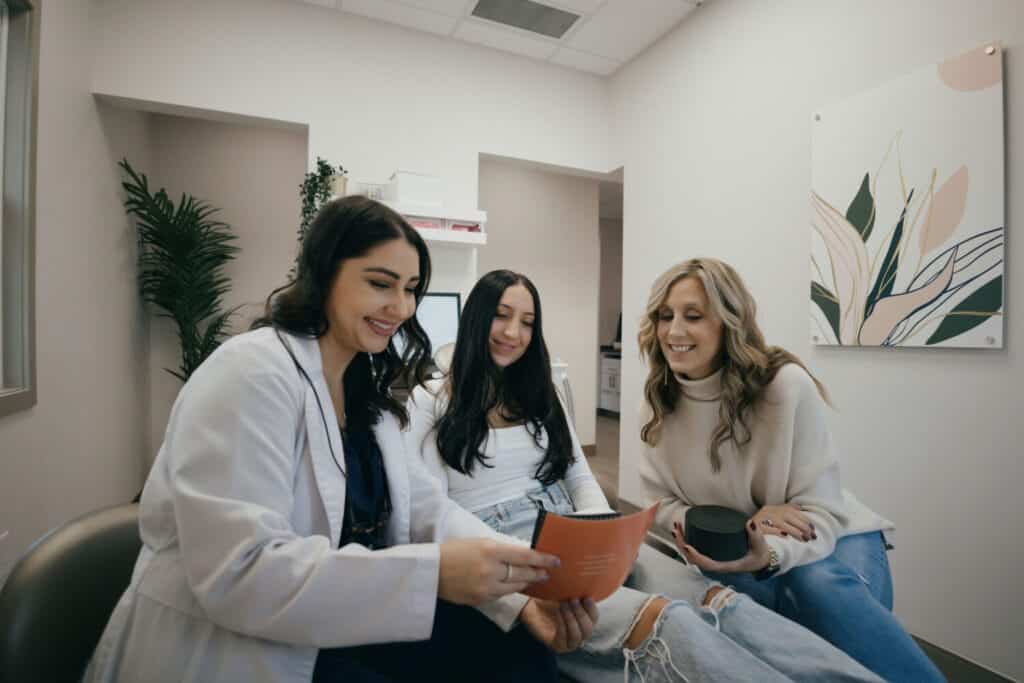 Lifestyle Family Dentistry patient reviewing her treatment plan with Dr. Josetta